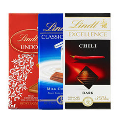 LINDT CLASSIC RECI[E FRUIT & NUTS CREAMY SMOOTH MILK CHOCOLATE W/ RAISINS